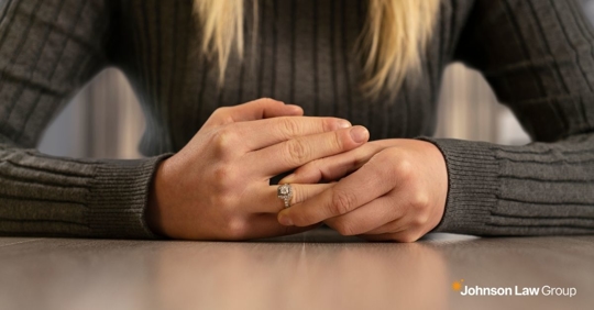 Woman playing with the ring on her finger