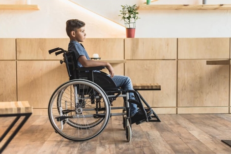 Teenage boy in a wheel chair